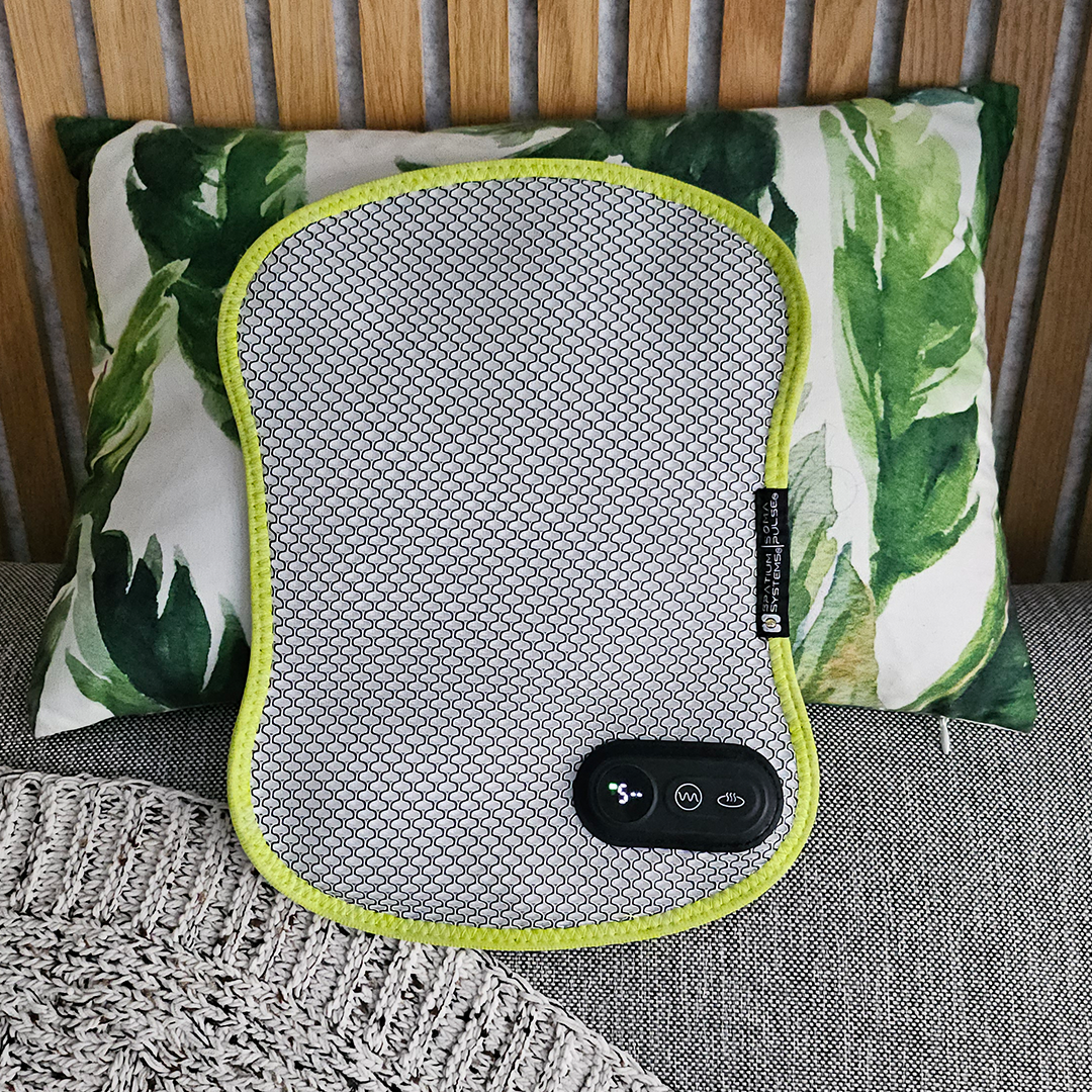A versatile, portable heat pad and vibration massager for effective stress and ache relief