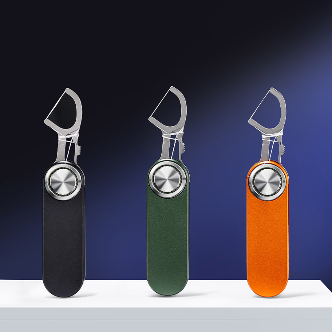 The Titanium Floss Tool That Lives On Your Keychain