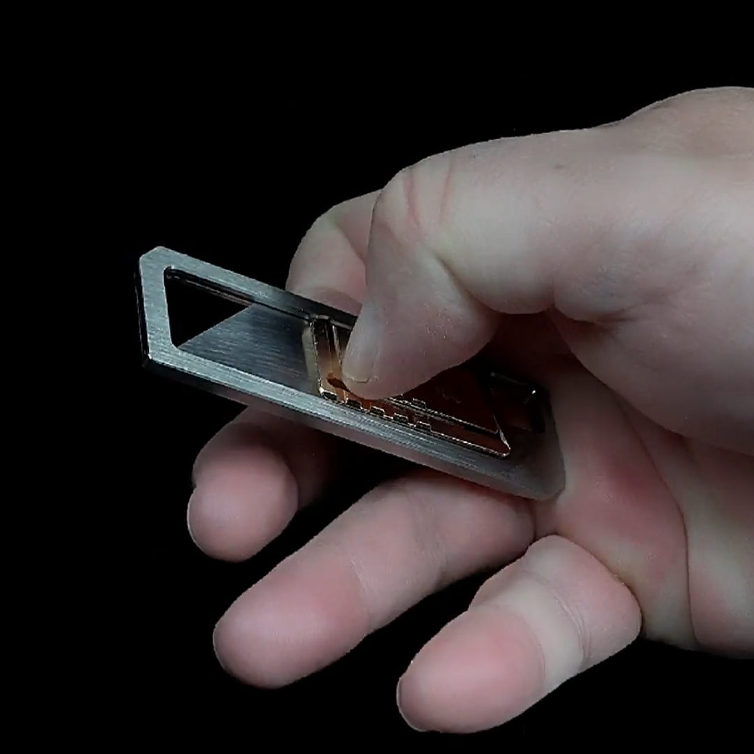 Ultra Slim Titanium Utility Tool With A Bronze Slider