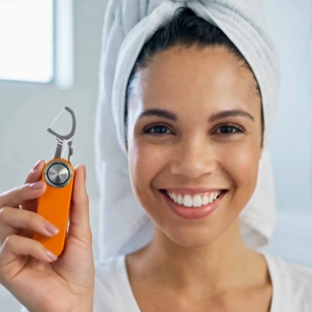The Titanium Floss Tool That Lives On Your Keychain