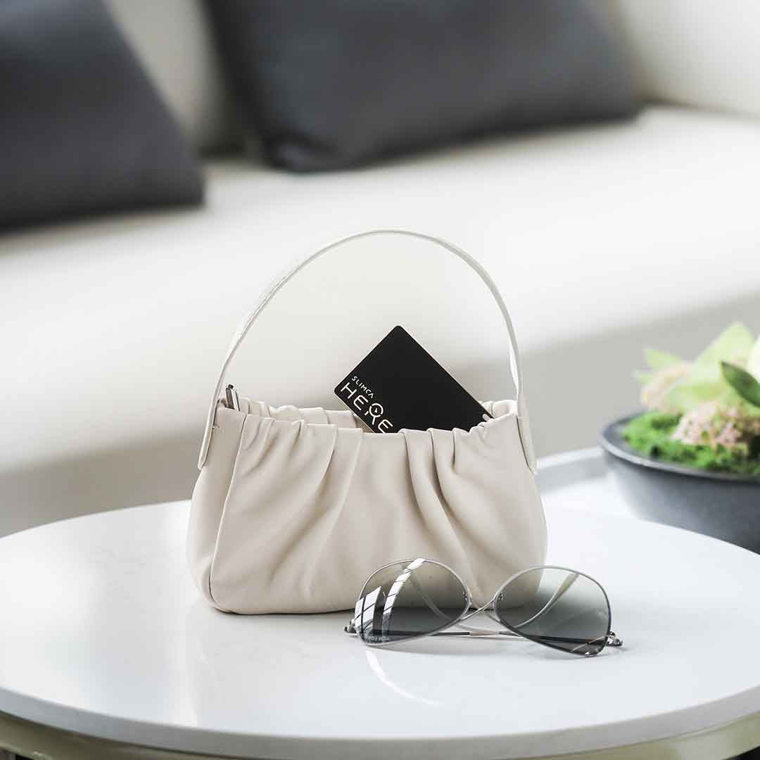 Thinner Than a Key. Smarter Than a Tag.