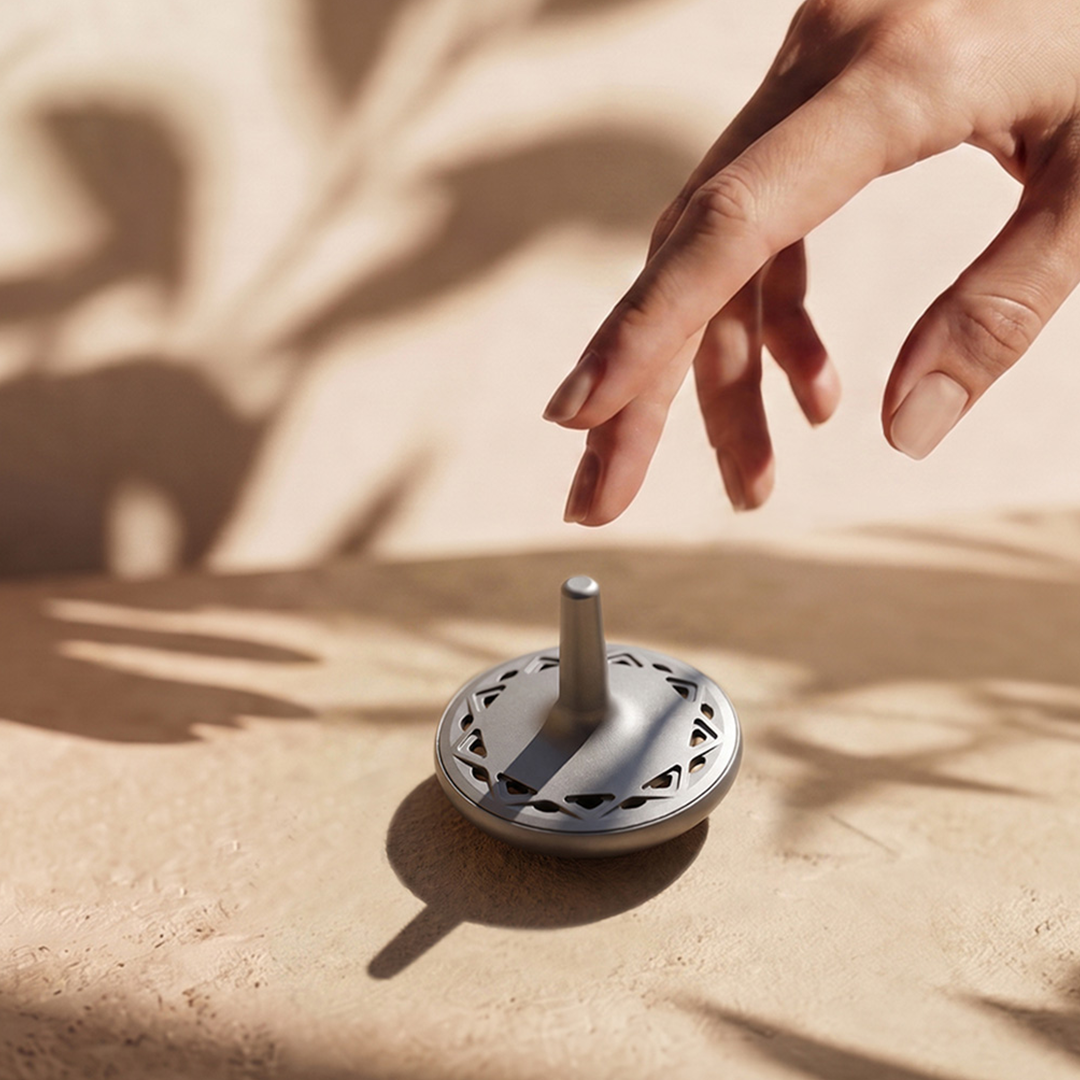 The Titanium Scent-Diffusing Spinning Top