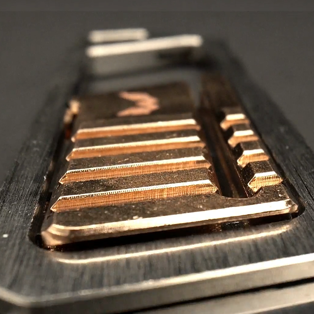 Ultra Slim Titanium Utility Tool With A Bronze Slider