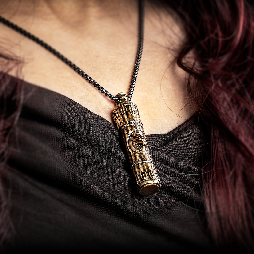 This Solid Brass Pendant Holds 7 Mini Dice
