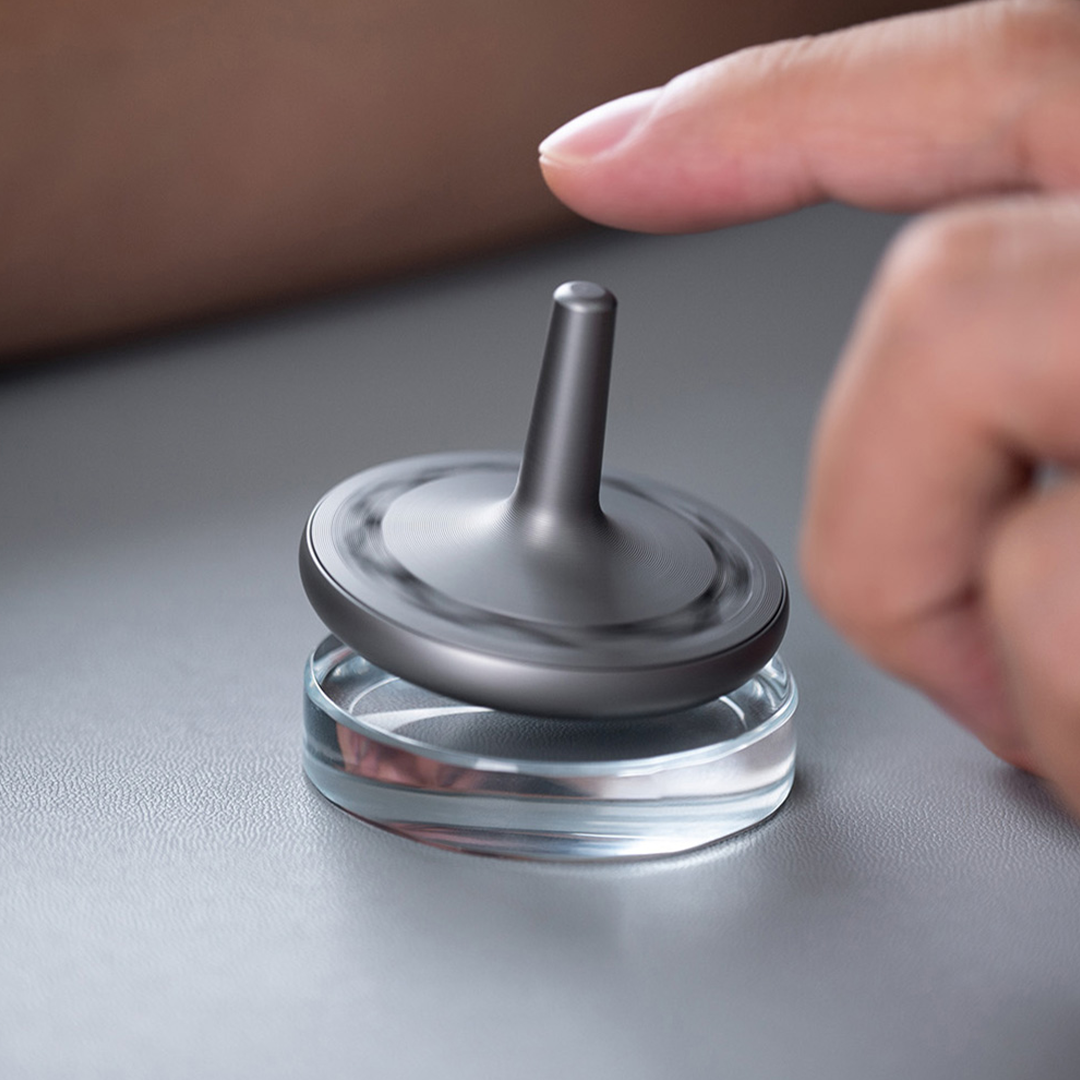 The Titanium Scent-Diffusing Spinning Top