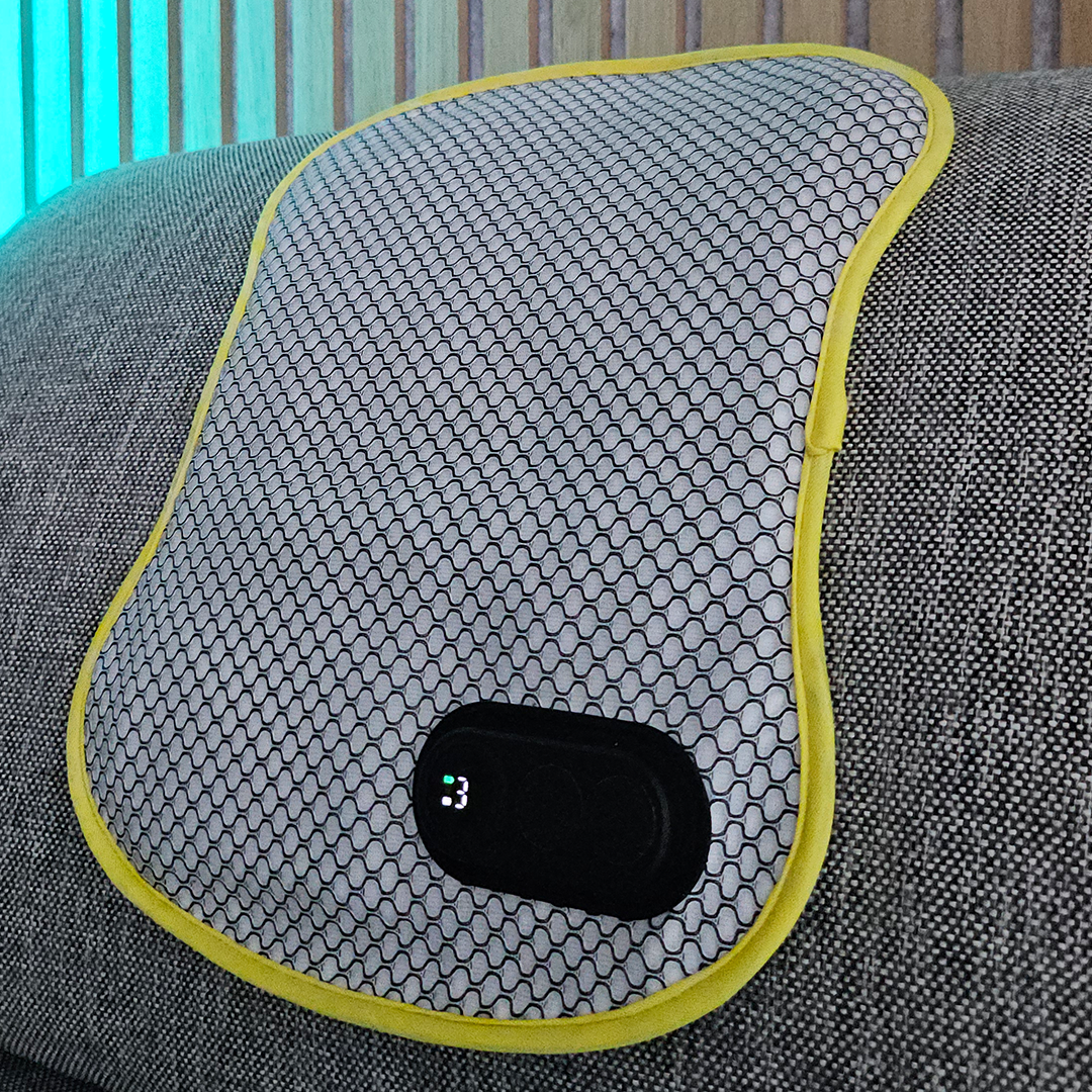 A versatile, portable heat pad and vibration massager for effective stress and ache relief