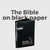 The Bible Printed On Black Paper With White Ink
