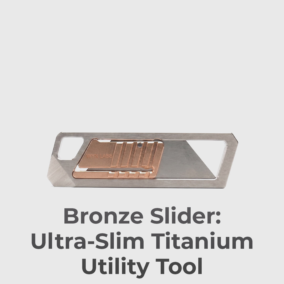 Ultra Slim Titanium Utility Tool With A Bronze Slider
