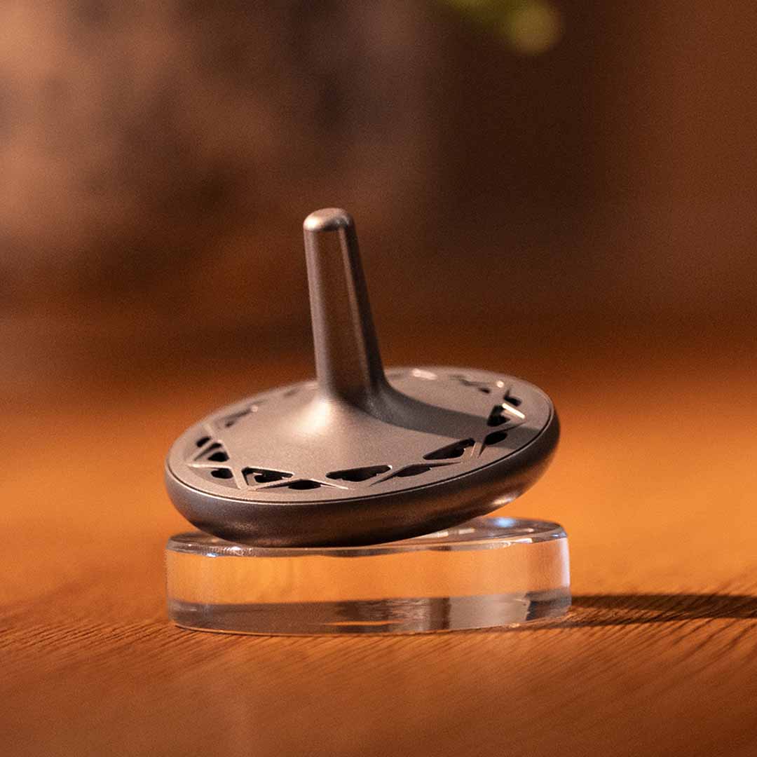 The Titanium Scent-Diffusing Spinning Top