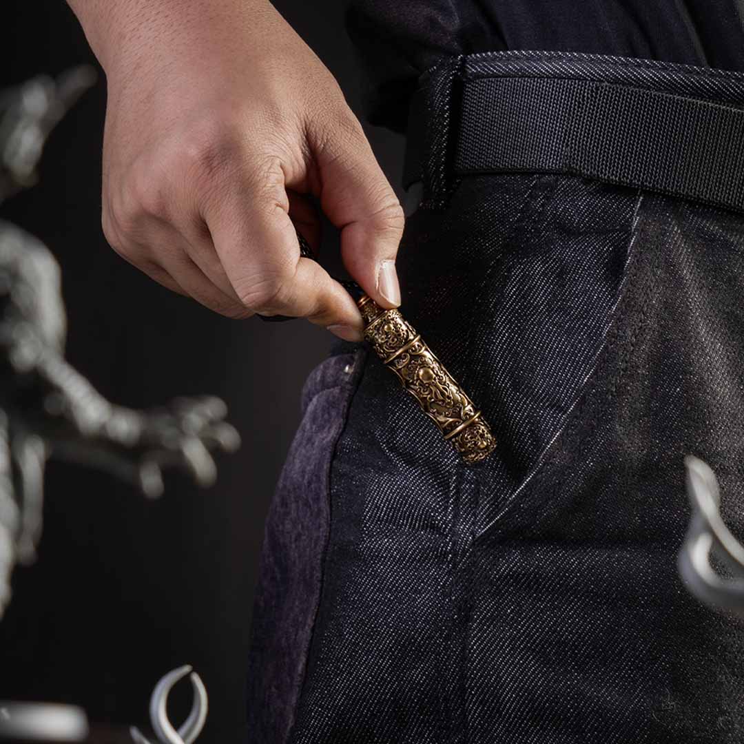 This Solid Brass Pendant Holds 7 Mini Dice