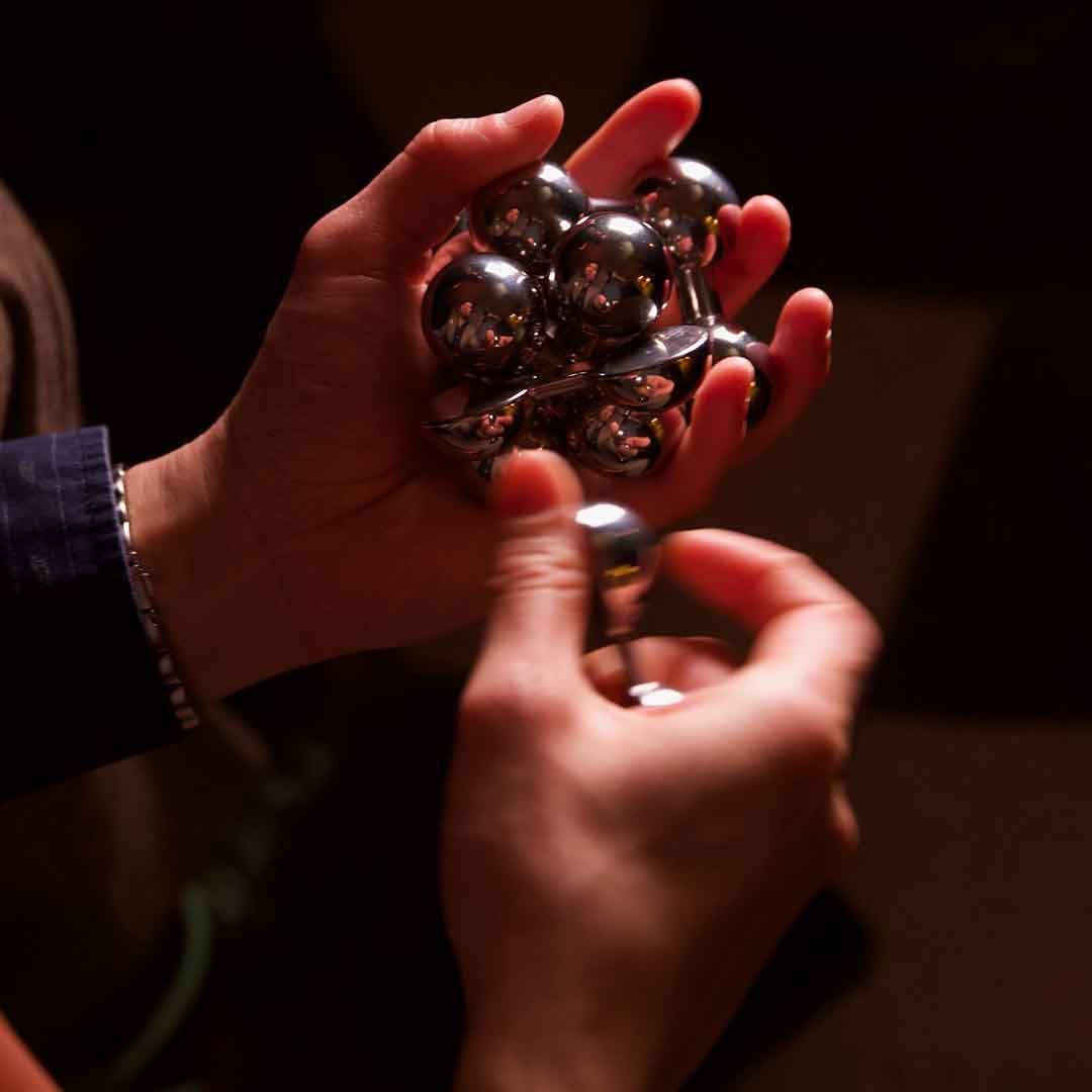 An Atom Inspired Mechanical Puzzle
