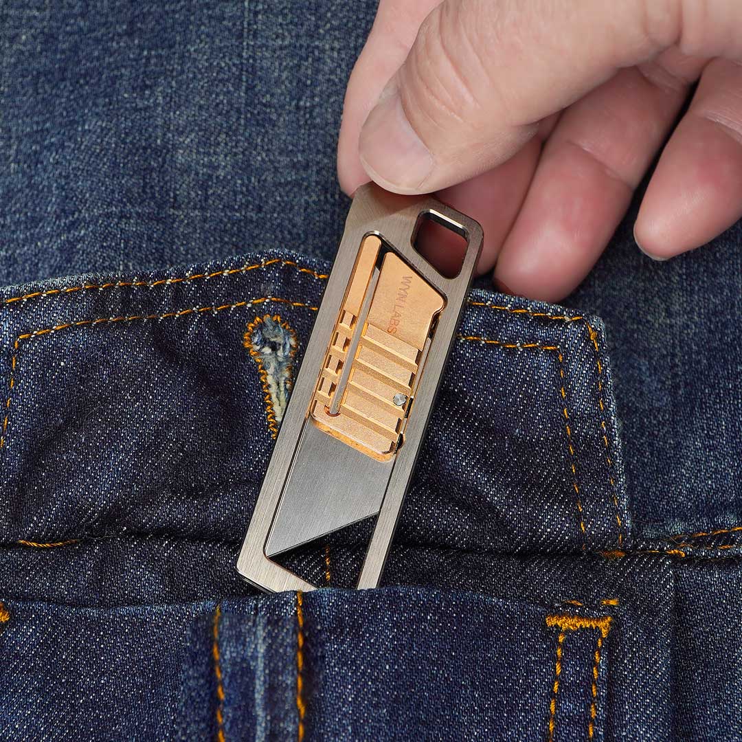 Ultra Slim Titanium Utility Tool With A Bronze Slider